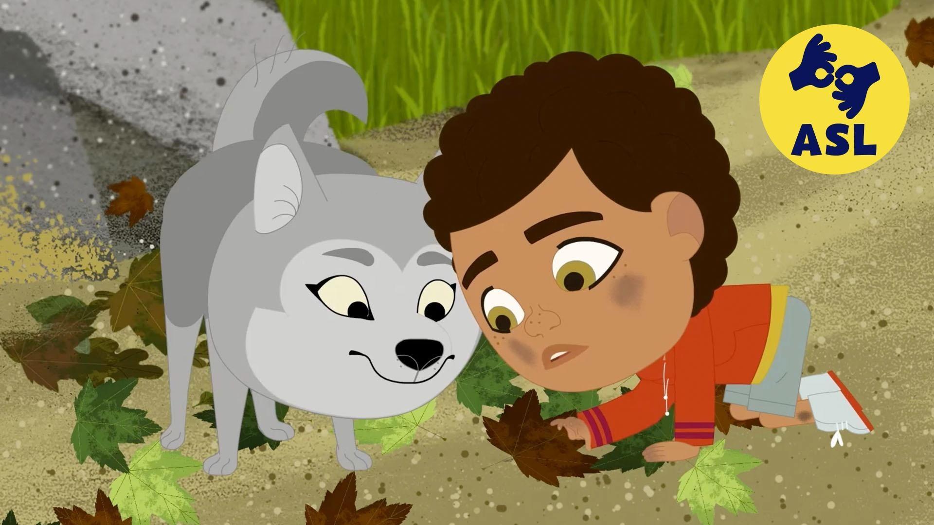 Looking at the ground near a rock, Rider and Wolfie find a family of roly poly bugs.